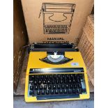 A boxed Silver Reed "Silverette"portable Typewriter