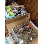 A box of mixed currency coins and a box of assorted stamps