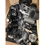 A box of camera bodies, lenses, movie cameras etc.