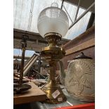 A brass oil lamp converted to electrical.