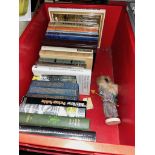 A box of vintage Jules Vernes books.