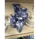 A pair of Losol Ware blue and white vases together with two other similar Losol Ware vases.