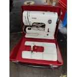 A Bernina cased electric sewing machine