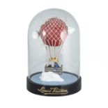 A LOUIS VUITTON NOVELTY HOT AIR BALLOON SNOW GLOBE GIVEN TO VIP CUSTOMERS & ACCOMPANIED BY