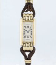 A RARE LADIES 18K SOLID GOLD CARTIER FRANCE DUOPLAN WRIST WATCH CIRCA 1930 Movement: Manual back