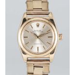 A GENTLEMAN'S 14K SOLID GOLD ROLEX OYSTER PERPETUAL CHRONOMETER "BUBBLE BACK" BRACELET WATCH CIRCA