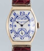 A VERY RARE GENTLEMAN'S 14K SOLID ROSE GOLD LARGE TONNEAU CASED LONGINES WRIST WATCH DATED 1915,