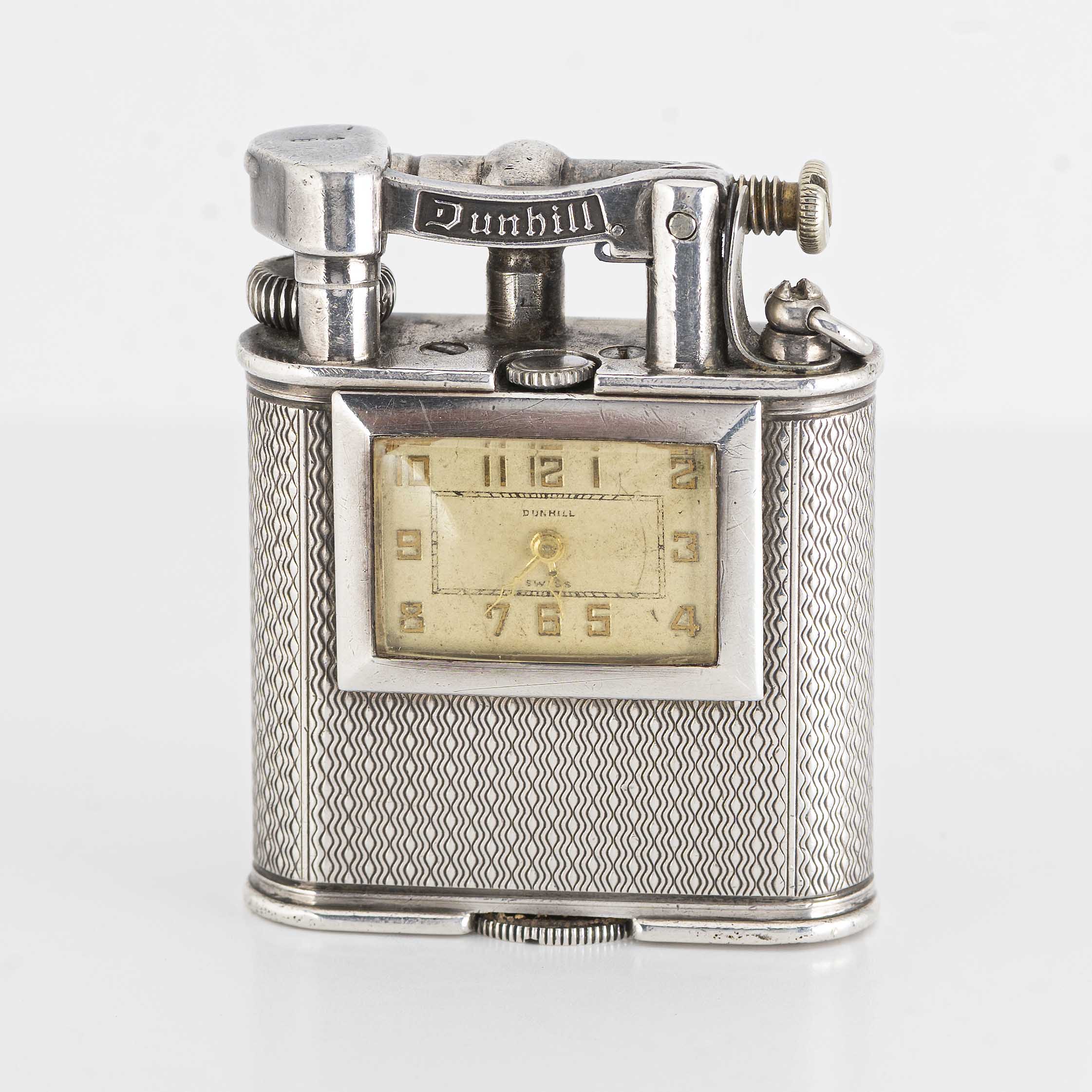 A RARE SOLID SILVER DUNHILL UNIQUE 'A' SELF WINDING WATCH LIGHTER CIRCA 1930s Movement: Manual