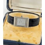 A RARE GENTLEMAN'S 18K SOLID WHITE GOLD BOUCHERON REFLET WRIST WATCH DATED 1966, WITH LONDON