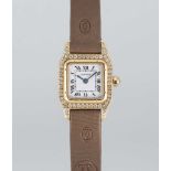 A LADIES 18K SOLID GOLD & DIAMOND CARTIER SANTOS DUMONT "MINI" WRIST WATCH CIRCA 1990s Movement: