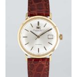 A GENTLEMAN'S 18K SOLID GOLD IWC AUTOMATIC DATE WRIST WATCH CIRCA 1970, WITH SIGMA DIAL Movement: