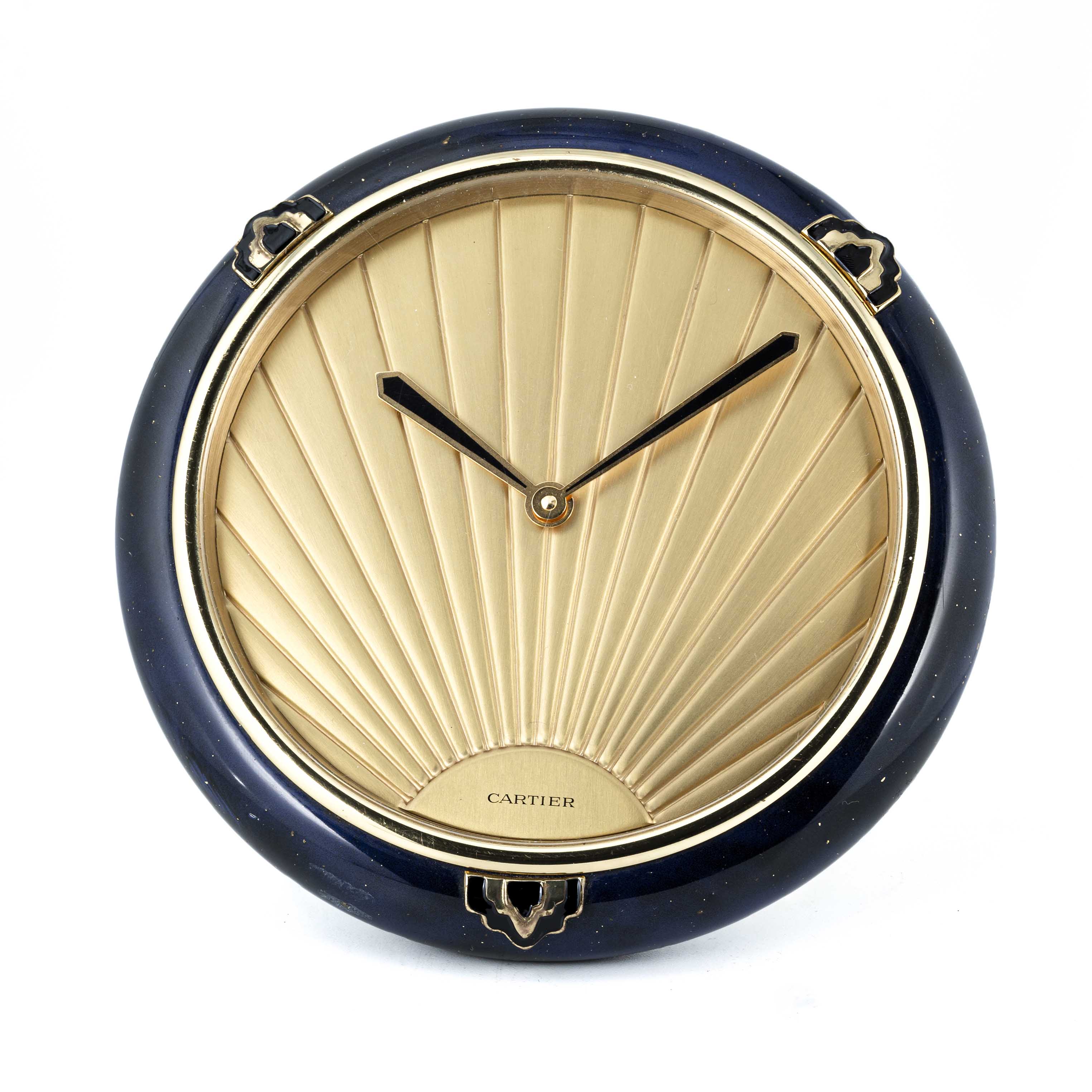 AN ART DECO STYLE CARTIER DESK CLOCK WITH LACQUERED LAPIS LAZULI EFFECT CASE & "RISING SUN " DIAL