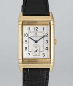 A FINE GENTLEMAN'S 18K SOLID GOLD JAEGER LECOULTRE GRANDE TAILLE REVERSO WRIST WATCH CIRCA 2000s,