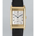 A FINE GENTLEMAN'S 18K SOLID GOLD JAEGER LECOULTRE GRANDE TAILLE REVERSO WRIST WATCH CIRCA 2000s,