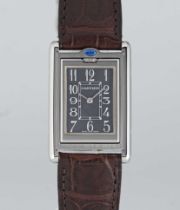 A GENTLEMAN'S SIZE STAINLESS STEEL CARTIER TANK BASCULANTE WRIST WATCH CIRCA 2000s, REF. 2405 WITH