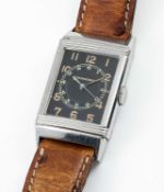 A RARE STAINLESS STEEL JAEGER LECOULTRE REVERSO WRIST WATCH CIRCA 1930s, WITH ORIGINAL BLACK