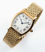 A FINE GENTLEMAN'S SIZE 18K SOLID GOLD CARTIER PARIS TORTUE MECANIQUE BRACELET WATCH CIRCA 1980s