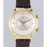 A GENTLEMAN'S 18K SOLID GOLD JAEGER LECOULTRE MEMOVOX AUTOMATIC ALARM WRIST WATCH CIRCA 1960s,