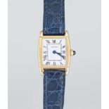 A RARE LADIES 18K SOLID GOLD CARTIER PARIS REVERSO WRIST WATCH CIRCA 1970s Movement: Manual wind,