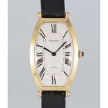 A GENTLEMAN'S 18K SOLID GOLD CARTIER PARIS CINTREE TONNEAU WRIST WATCH CIRCA 1990s Movement: