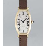 A FINE LADIES 18K SOLID GOLD CARTIER PARIS CINTREE TONNEAU WRIST WATCH CIRCA 1990s Movement: