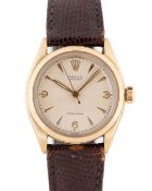 A RARE GENTLEMAN'S 10K SOLID GOLD ROLEX OYSTER PRECISION WRIST WATCH CIRCA 1952, REF. 6022 WITH 3-