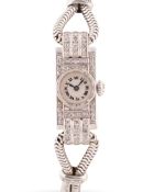 A FINE LADIES PLATINUM & DIAMOND IWC BRACELET WATCH CIRCA 1930s Movement: 17J, manual wind, signed