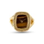 A RARE 18K SOLID GOLD BUECHE GIROD RING WATCH CIRCA 1970s, WITH TIGERS EYE STONE DIAL Movement: 17J,