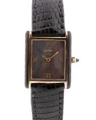 A RARE GENTLEMAN'S SIZE GOLD PLATED & WOOD CARTIER TANK WRIST WATCH CIRCA 1980 Movement: Manual