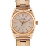 A GENTLEMAN'S 14K SOLID GOLD ROLEX OYSTER PERPETUAL CHRONOMETER "BUBBLE BACK" BRACELET WATCH CIRCA