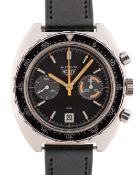 A GENTLEMAN'S STAINLESS STEEL HEUER AUTAVIA "ORANGE BOY" CHRONOGRAPH WRIST WATCH CIRCA 1970s, REF.