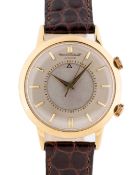 A GENTLEMAN'S 18K SOLID GOLD JAEGER LECOULTRE MEMOVOX AUTOMATIC ALARM WRIST WATCH CIRCA 1960s,