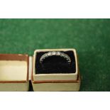 18ct white gold ladies ring set with single band of ten small diamonds Please note descriptions