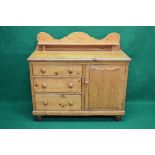 Victorian pine dresser base having raised back with shelf over three graduated left hand drawers