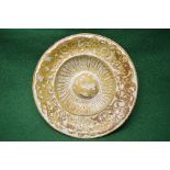 Large circular pottery wall plate having domed centre with scrolled gold glazed pattern and a lustre