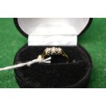 18ct gold ladies ring set with a row of three small diamonds (gross weight 2.8gms) Please note
