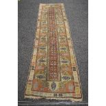 Beige ground carpet runner having blue, rust and mustard pattern - approx 2.83m x 0.74m Please