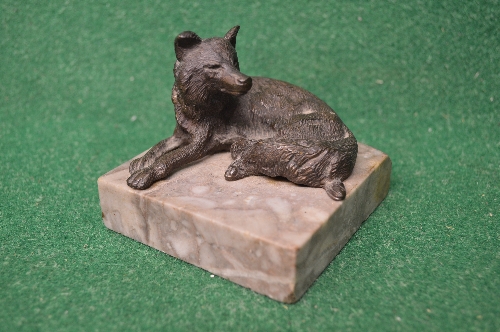 Bronze figure of a recumbent fox on a square grey marble base - 3.25" wide Please note