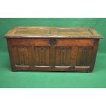 Period oak coffer having two panelled lid opening to reveal right hand candle box and storage space,