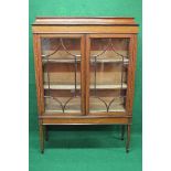 Inlaid Edwardian mahogany display cabinet having two glazed doors enclosing a lined interior and two