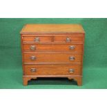 Mahogany crossbanded chest of drawers the top having reeded edge over two short and three long