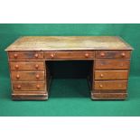 Victorian pine desk the top having moulded edge over three drawers with turned knob handles