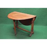 Victorian mahogany Sutherland table having bow ends and D shaped drop leaves, supported on turned