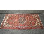 Red ground rug having blue, white and pink pattern - approx 1.20m x 1.08m Please note descriptions