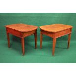 Pair of 20th century mahogany lamp tables having crossbanded tops with bow ends and standing on