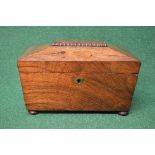 19th century rosewood sarcophagus shaped tea caddy having brass shield shaped escutcheons the top