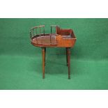 Mahogany maids tray on stand the top having two sections divided by pierced carrying handle and