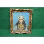20th century unsigned oil on canvas of a young child wearing feathered headdress and ceremonial