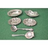 Group of silver items to comprise: pair of pierced bon bon dishes, two other pierced bon bon dishes,