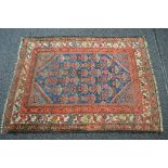 Blue ground rug having red, white and brown pattern - approx 1.88m x 1.33m Please note
